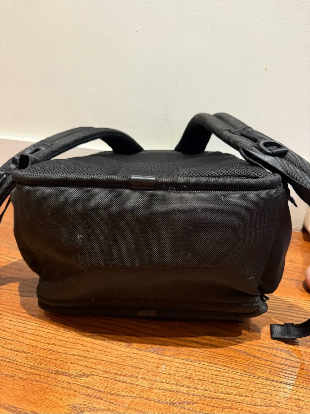 Tumi Black Backpack with Multiple Front Pockets
